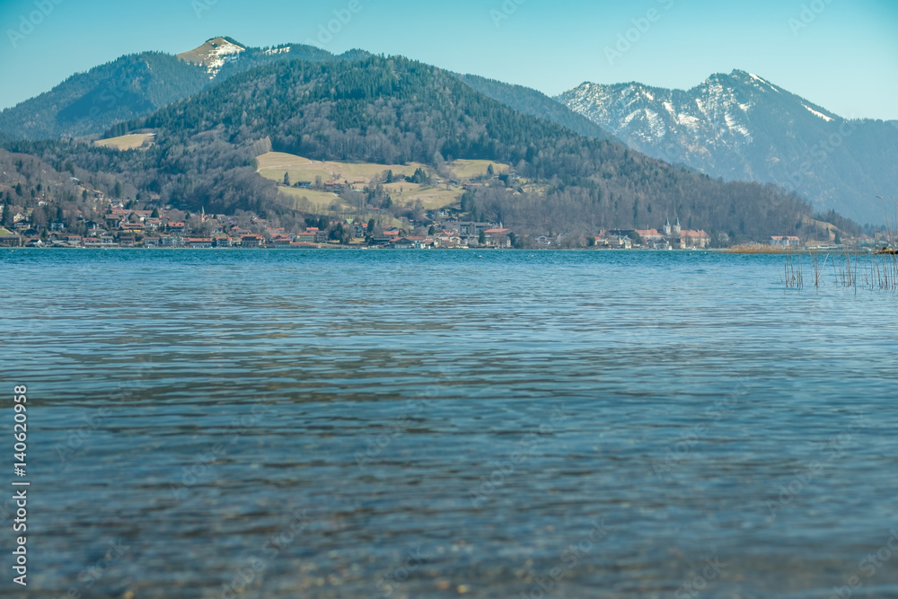 View of the alpine lake Tegernsee in Bavaria with mountains in the background