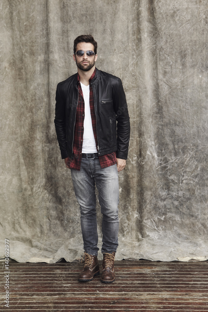Jacket and boots guy in studio, portrait Jacket and boots guy in studio, portrait