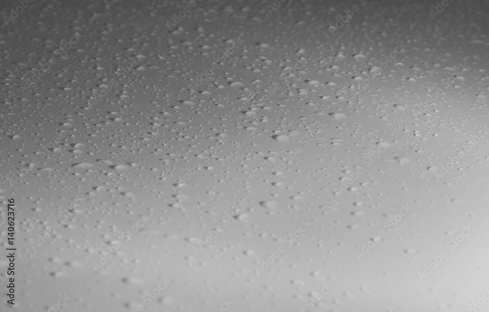 Water drops on steel surface with selective focus