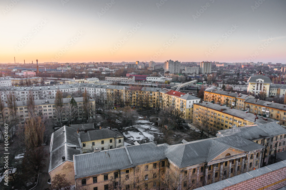 Cityscape sunset, aerial view from rooftop of Voronezh city, houses, dormitories