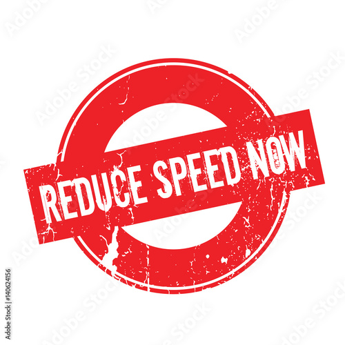 Reduce Speed Now rubber stamp. Grunge design with dust scratches. Effects can be easily removed for a clean, crisp look. Color is easily changed.