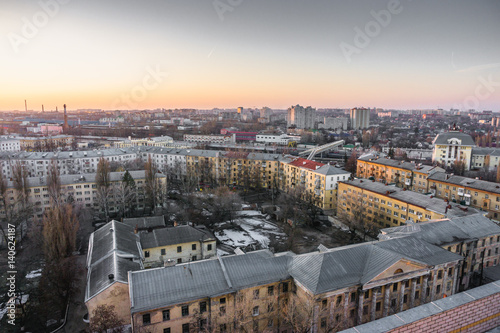 Cityscape sunset, aerial view from rooftop of Voronezh city, houses, dormitories © DedMityay