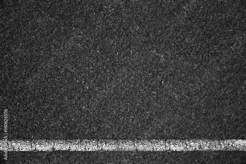 Asphalt background texture with some fine grain of road