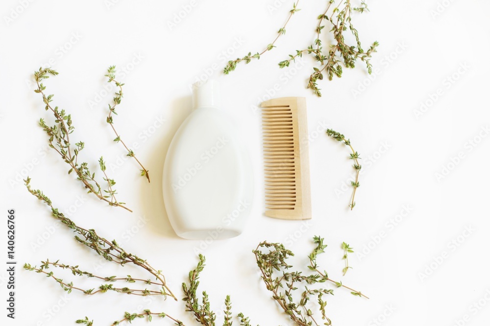 Flat lay bath products/ Natural bath products. Shampoo and wooden comb. Top view photography - obrazy, fototapety, plakaty 