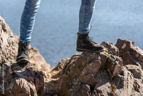 hiking in the mountains with dark boots