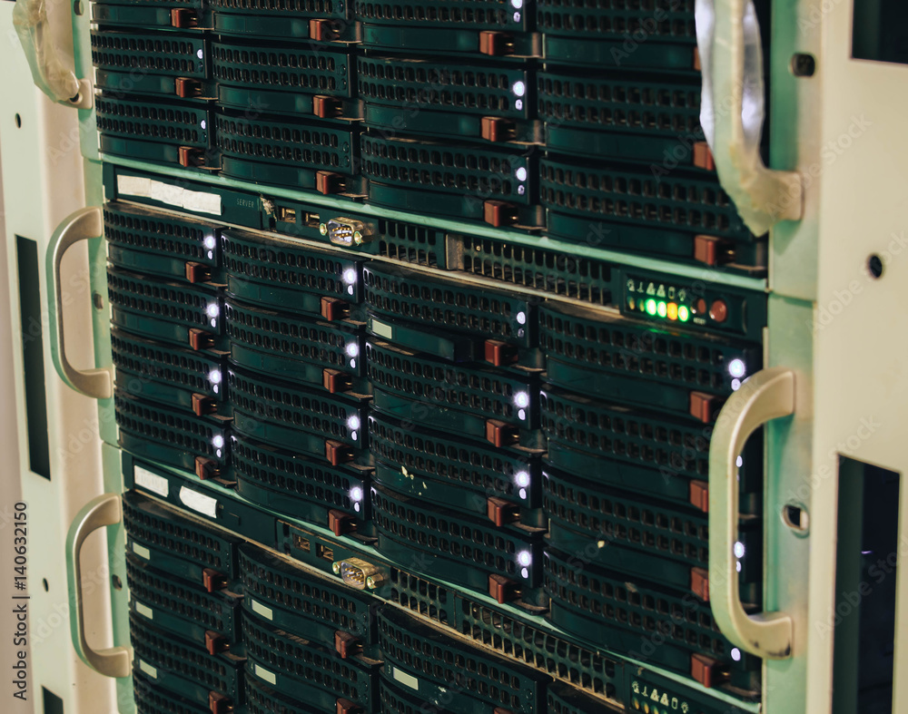 Multiple Sergers Stand with multiple servers in the data center server room Stock Photo ...