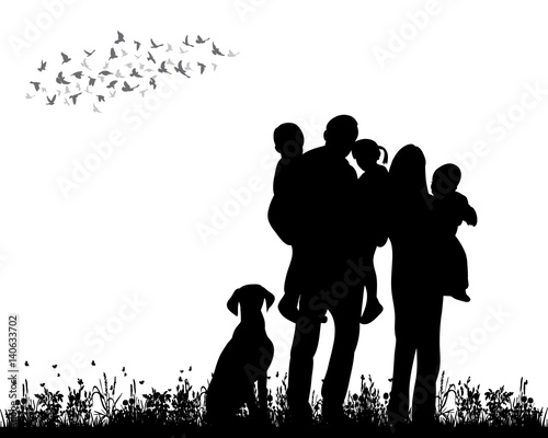 silhouette family walking on grass