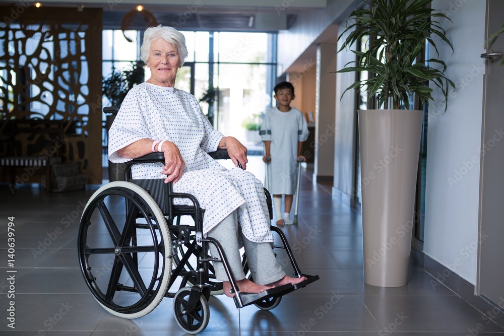 Disabled senior patient on wheelchair in hospital corridor Disabled senior patient on wheelchair in hospital corridor
