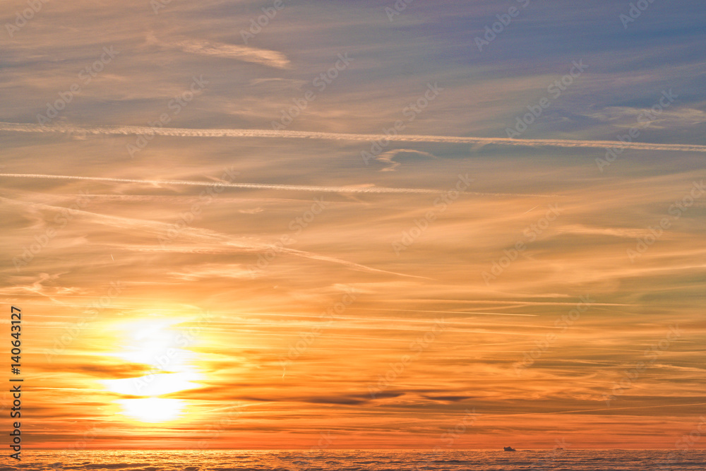 Amazing evening with sunset in mountains. Beautiful sunset within inversion