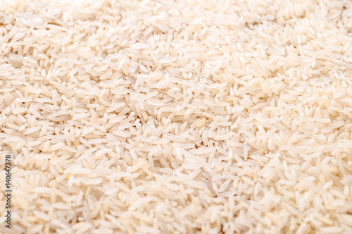 Close up to raw white Jasmine rice background