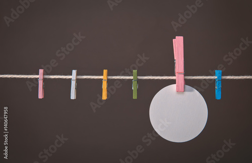 pins clothesline spring on nameplate. hd photo