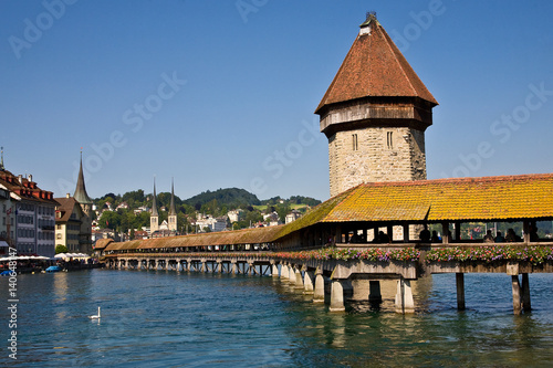 Old bridge over river in Lucerne, Switzerland.