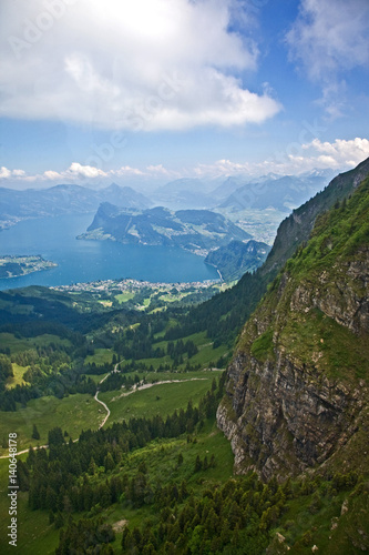 Fototapeta Naklejka Na Ścianę i Meble -  Descending from Mount Pilatus in cablecar. Looking down on Lake Lucerne with Beurgenstock in the background.