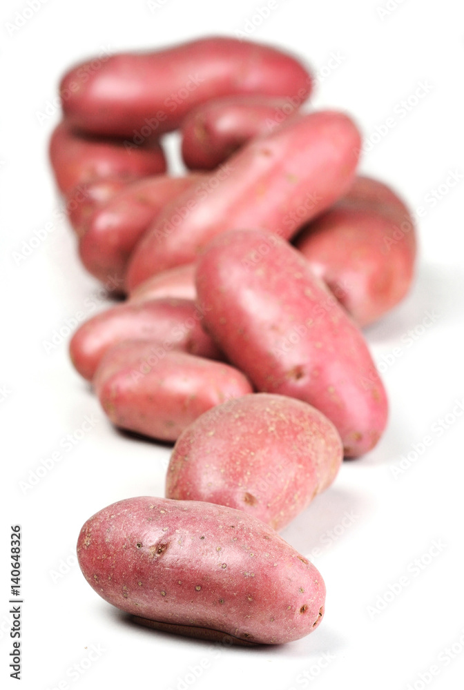 Close up of potato on white background Close up of potato on white background