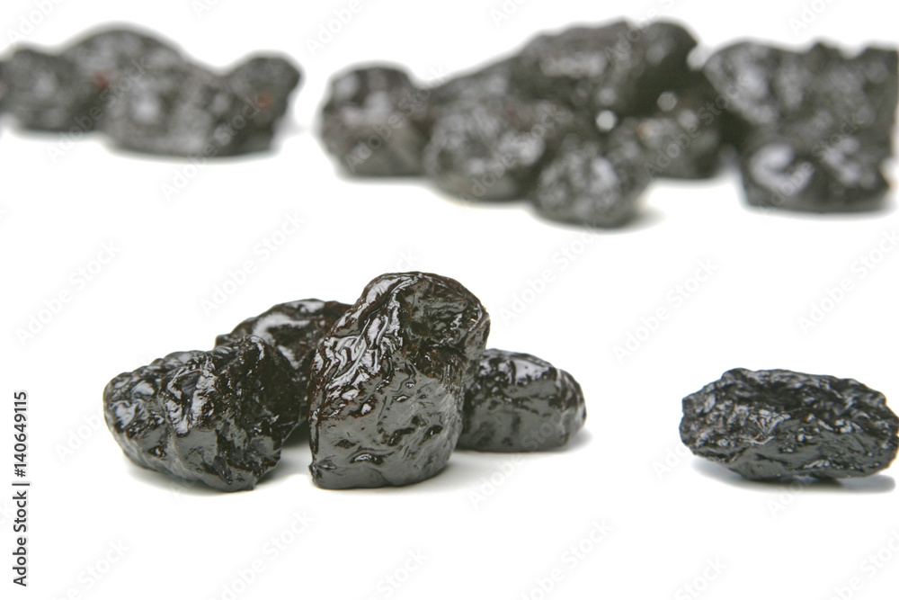 Studio shot of prunes on white background Studio shot of prunes on white background