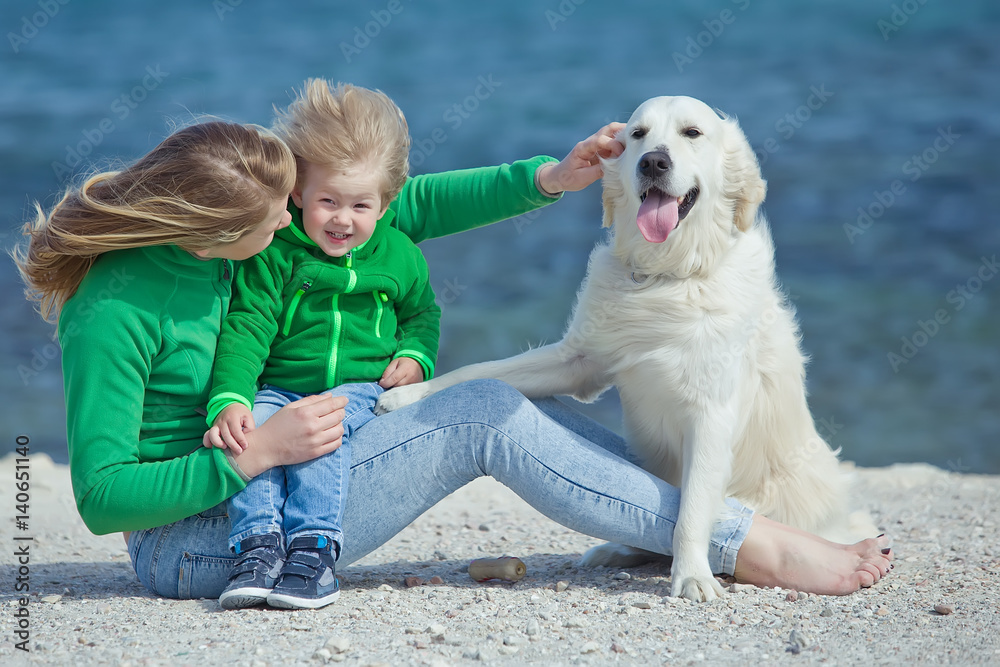 Woman and child with dog 