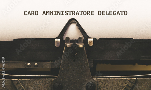 Caro amministratore delegato, Italian text for Dear Mr. CEO on vintage type writer from 1920s photo