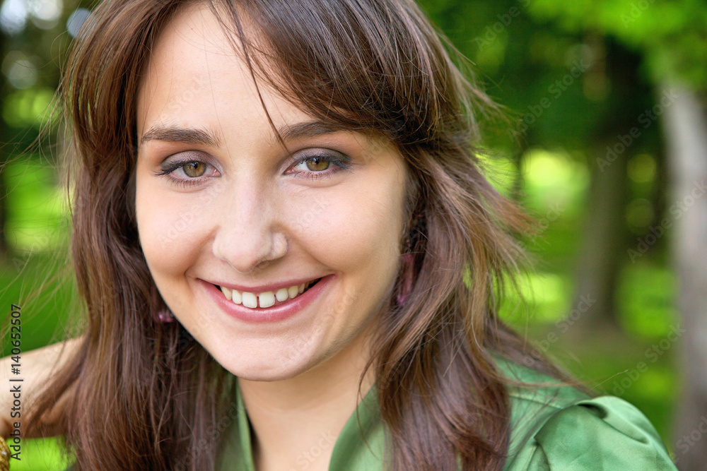 Portrait of cute young woman smiling Portrait of cute young woman smiling