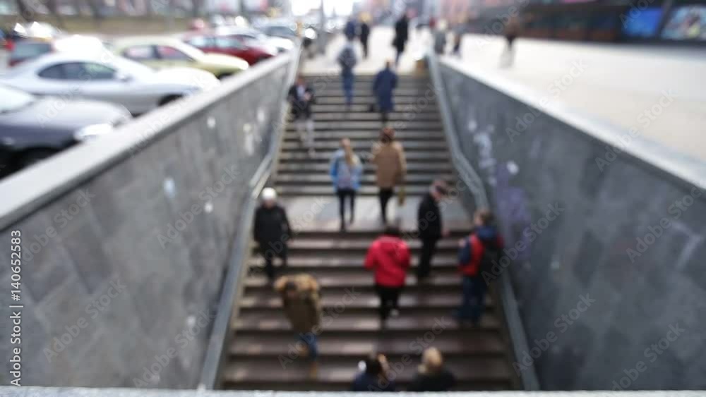 People walking on stairs to underground crossing People walking on stairs to underground crossing