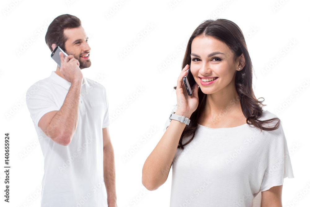 Couple using smartphones Couple using smartphones