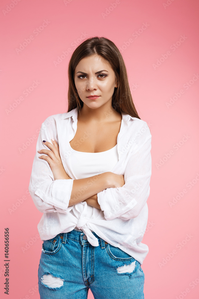 Ταπετσαρία Angry woman shows irritation looking straight at camera without smile