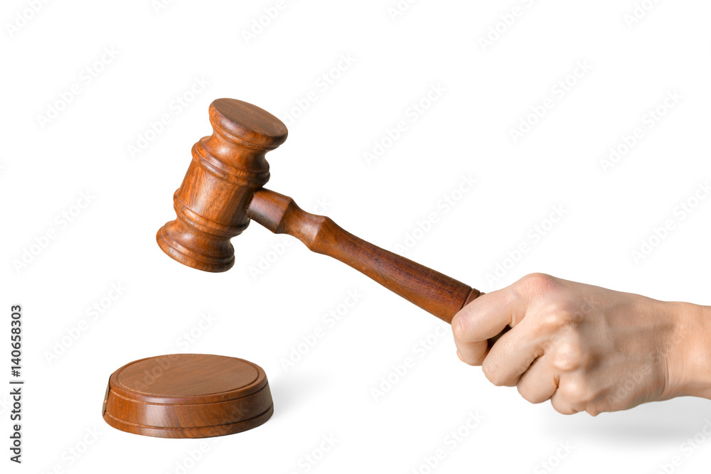 Hand holding Wooden Law Gavel isolated on white background Hand holding Wooden Law Gavel isolated on white background