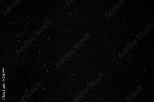 Abstract background of spray water drops on black background