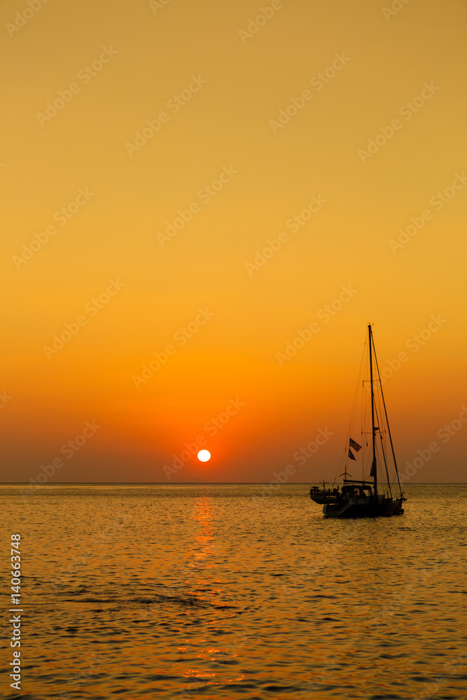 Sunrise on the sea with boat Sunrise on the sea with boat