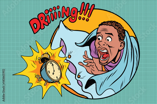 Man wakes up alarm clock