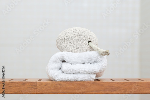Make-up and Spa Objects, on a little wooden shelf. Towel and Pumice Scrub Stone