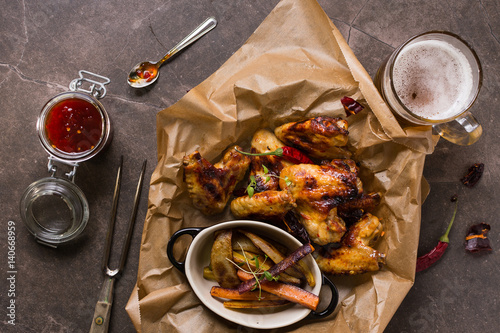 Spicy Chicken Wings with Hot Chili Jam, Baked Potatoes and Purple Carrots