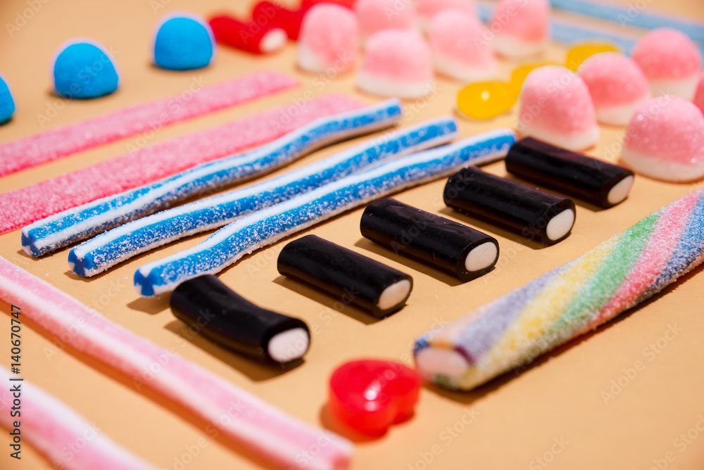 Naklejka premium Mixed colorful candies jellies