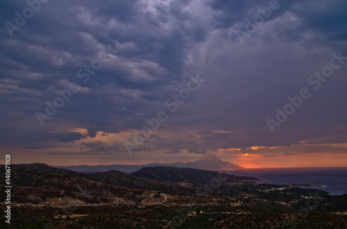 Stormy sky and sunrise at holy mountain Athos in Greece © banepetkovic