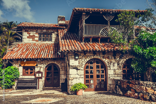 Retro processed image. Filtered hipster style photo of ancient style village building. Altos de Chavon, Dominican Republic.