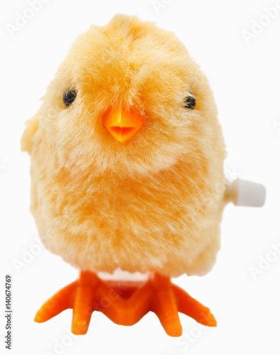 Isolated wind up toy chick. Focus on eyes and beak.