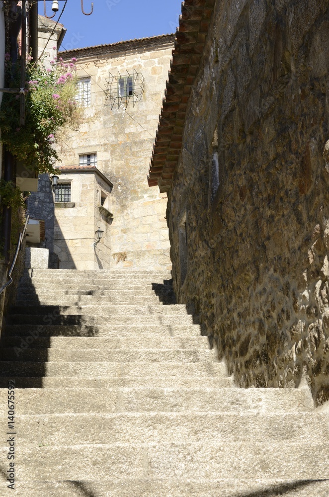 Steps in stone alley in Tui, Galicia, Spain