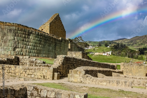 View to Temple of the Sun with rainbow, famous Inca ruins of Ingaprica, Ecuador photo
