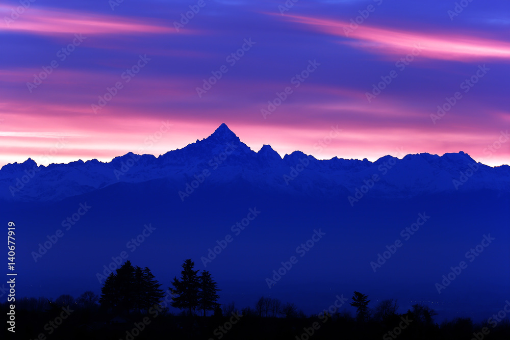 Purple sunset with Alps mountains