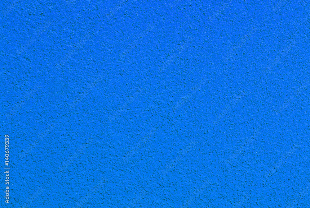 Textured blue stucco wall. Material design background Textured blue stucco wall. Material design background