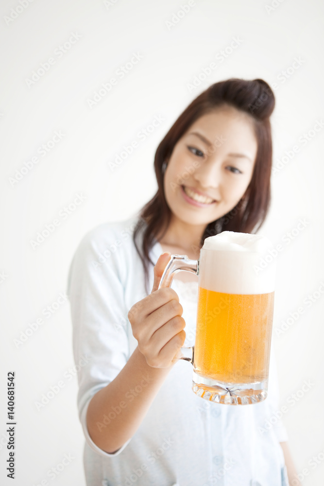 Young woman with a glass of beer Young woman with a glass of beer