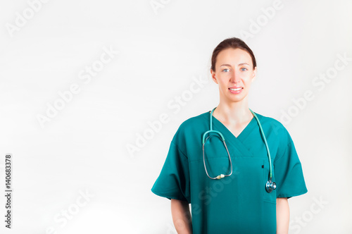 Portrait of young attractive doctor, surgeon, nurse with stethoscope © artursfoto
