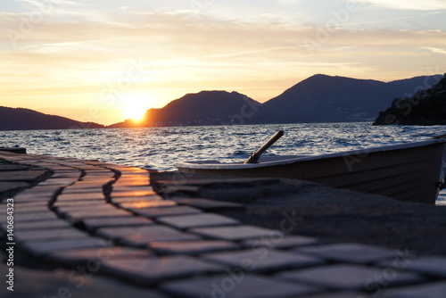 Fototapeta Naklejka Na Ścianę i Meble -  Sunset in Tellaro with fisherman