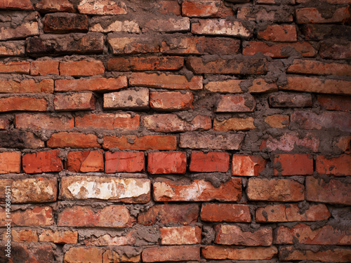 Old red brick wall textured wallpaper background