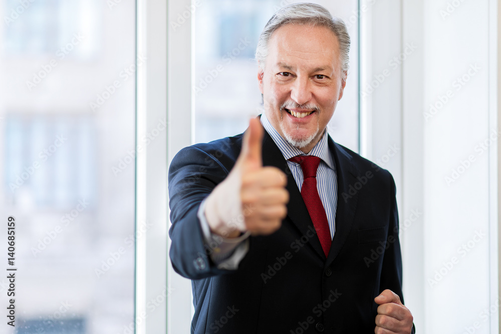 Male manager thumbs up on white background Male manager thumbs up on white background