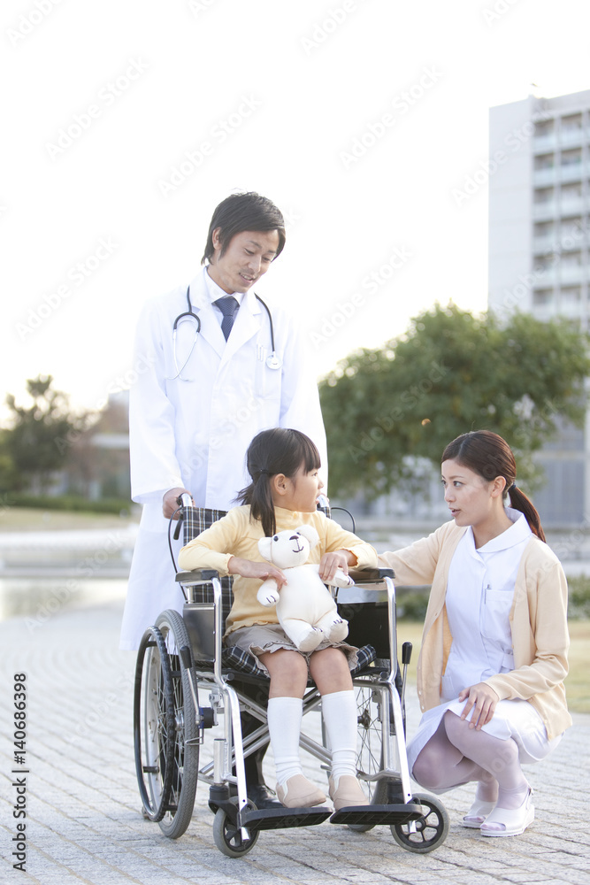 Nurse, Doctor and Girl in Wheelchair Nurse, Doctor and Girl in Wheelchair