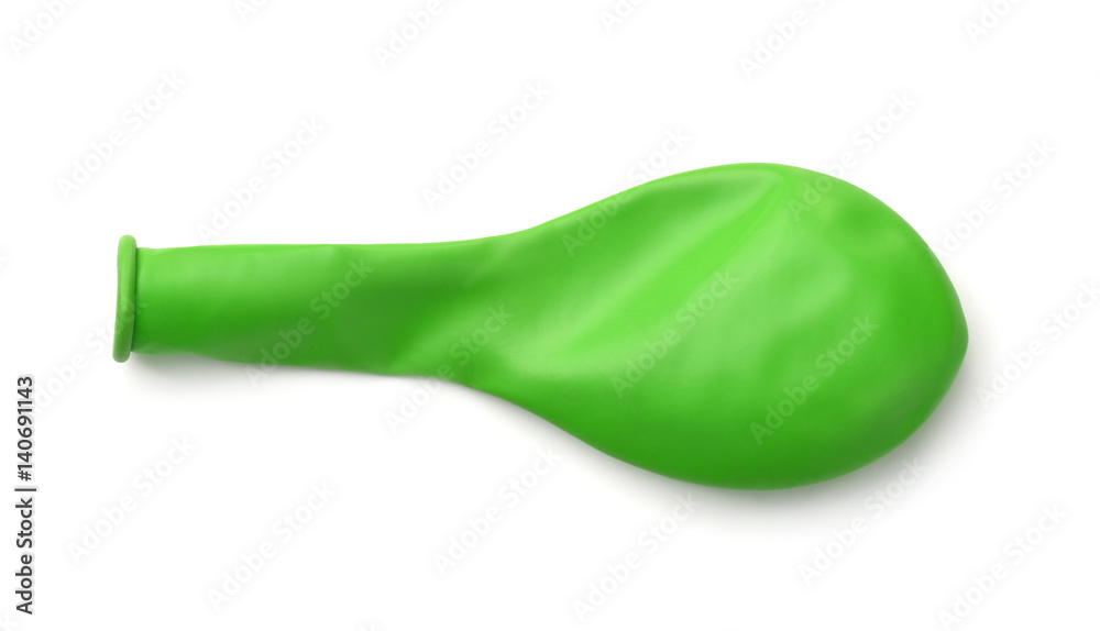 Obraz premium Top view of green deflated balloon