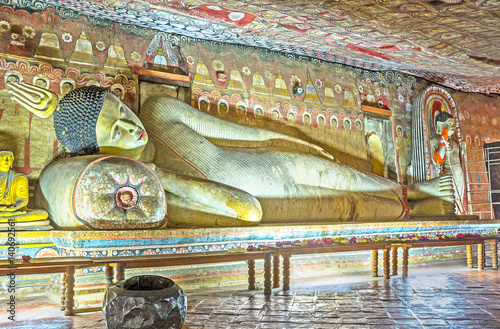 Reclining Lord Buddha in Maharaja Cave of Dambulla photo