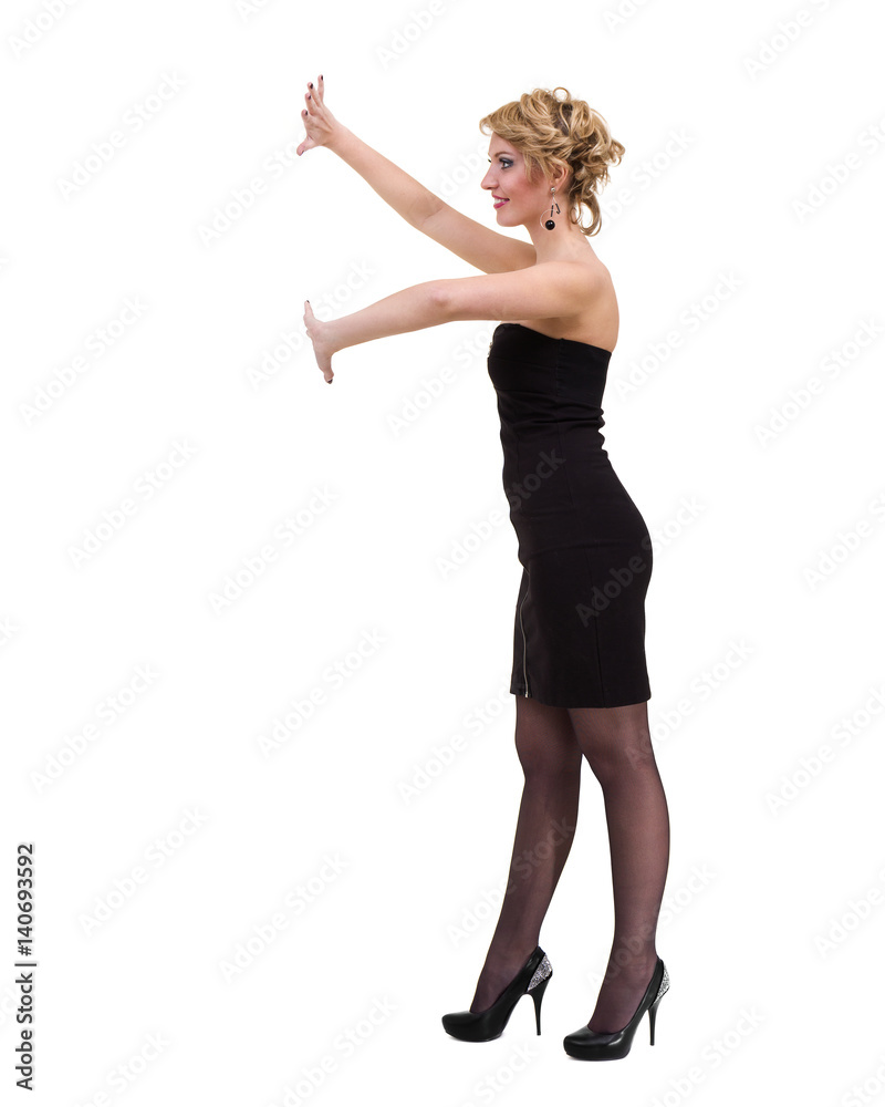 Sexy young woman in a little dress, isolated on white Sexy young woman in a little dress, isolated on white