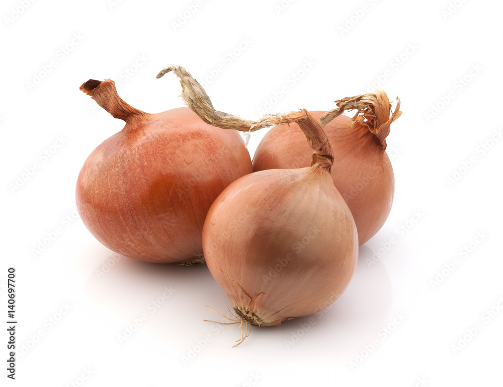 Closeup of golden onion on white background. Closeup of golden onion on white background.