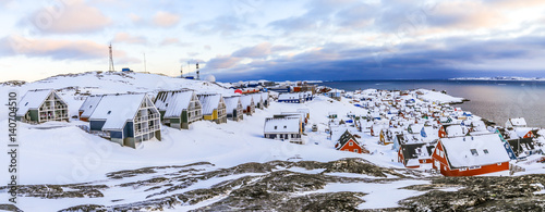 Inuit houses covered in snow. Nuuk city spring panorama, Greenland